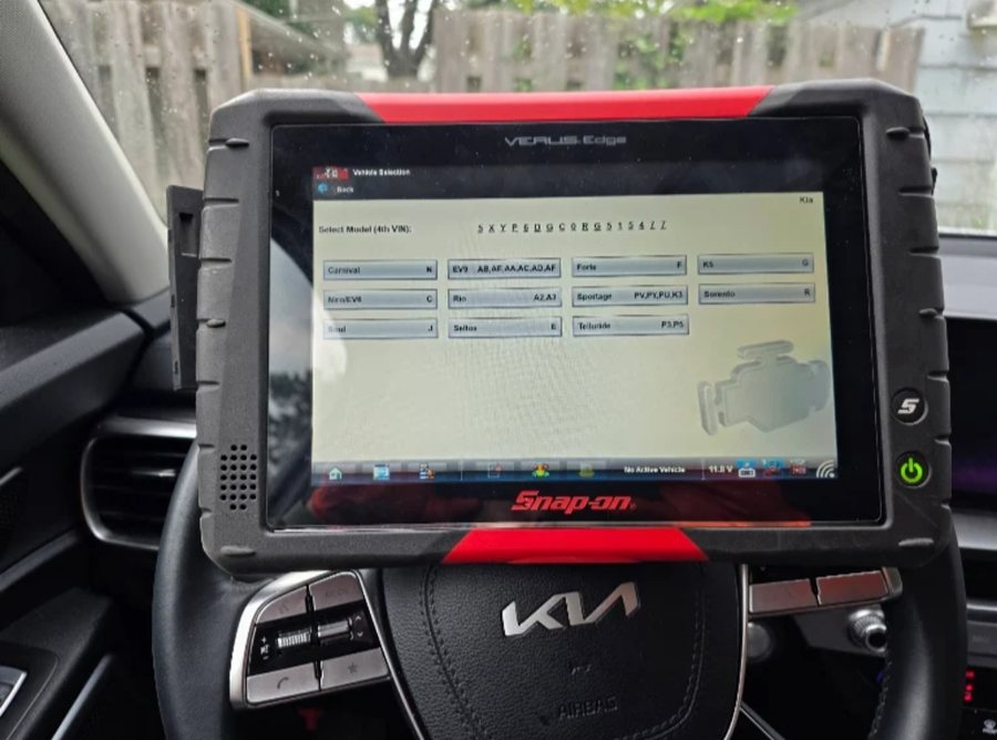 Dave's Mobile Garage running a check engine diagnostic scan